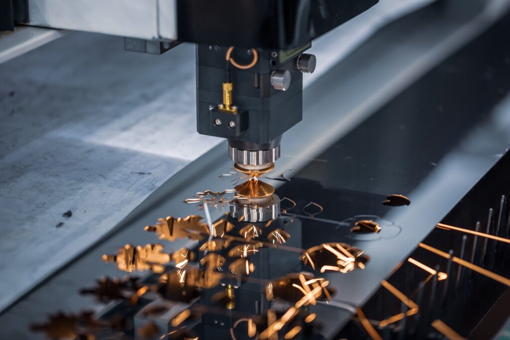 CNC Laser cutting of metal, modern industrial technology.